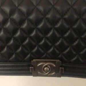 Black quilted handbag